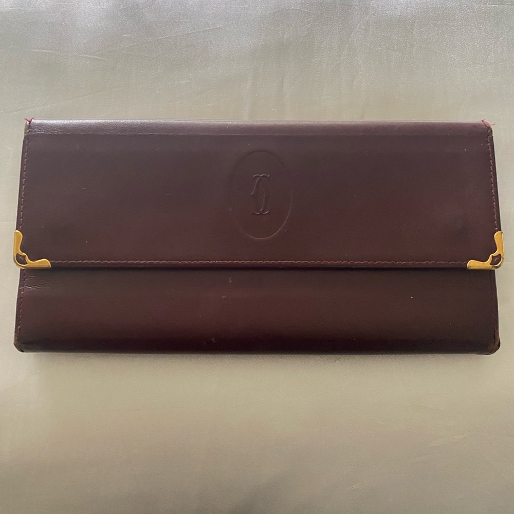 Cartier women’s long wallet bi-fold,leather Bordeaux,Closure Ball Clasp
